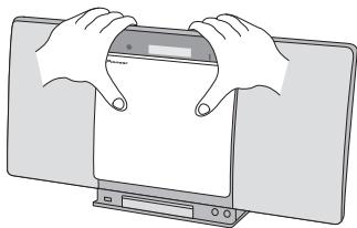 PIONEER X-SMC00DAB - Using both hands, slide the changeable panel up to remove it. - 1
