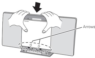 PIONEER X-SMC00DAB - Align the line below the arrow and the bottom of the changeable panel, then slide downward using both hands until you hear a clicking sound. - 1