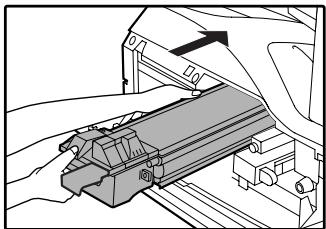 SAGEM MF 9323/ MF 9327 - While pushing the lock release lever, gently insert the toner cartridge along the guides until it clicks into place. - 2