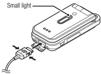 SHARP V703SH - Using the Charger - 1