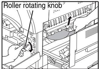 SHARP AR-5620D - Carefully remove the misfed paper. Turn the roller rotating knob in the direction of the arrow to assist in removing it. - 1