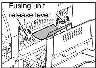 SHARP AR-5620D - Carefully remove the misfed paper. Lower the fusing unit release levers to allow easier removal. - 1