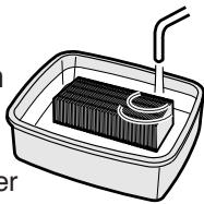 SHARP KC-6500E - Sprühnebelfilter mit Wasser ausspüssen. - 1