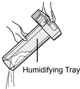 SHARP KC-830U - Remove the Humidifying filter from the Humidifying Tray. Drain accumulated water by tilting the Humidifying Tray slowly. - 2