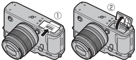 FUJIFILM X-PRO2 - Ouvrez le couvercle du compartiment de la batterie. - 1