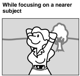 While focusing on a nearer subject