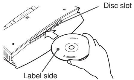 JVC TH-V70R - Insert a disc into the disc slot with the label side facing the front or up as shown below. - 2