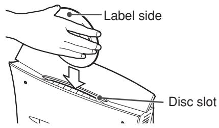 JVC TH-V70R - Insert a disc into the disc slot with the label side facing the front or up as shown below. - 1