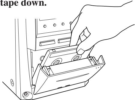 JVC UX-J50 - Put a cassette in with the exposed part of the tape down. - 1