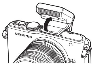 OLYMPUS PT-EP05L - Attach the flash to the camera and raise the light emitting part - 1