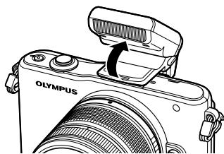 OLYMPUS E-PM1 - Removing the lens from the camera - 3