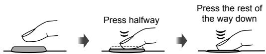 OLYMPUS E-PM1 - Pressing the shutter button halfway and all the way down - 1