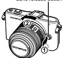 OLYMPUS E-PM1 - Removing the lens from the camera - 1