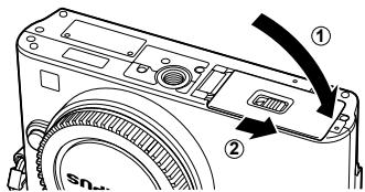 OLYMPUS E-PM1 - Closing the battery/card compartment cover. - 1
