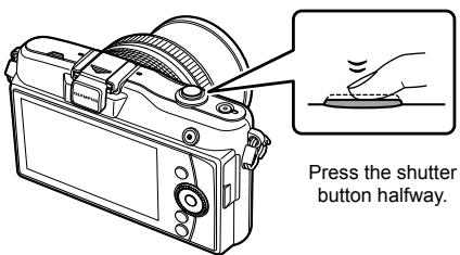 OLYMPUS E-PM1 - Adjust the focus. - 1