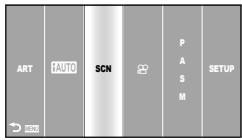 OLYMPUS E-PM1 - Select SCN as the shooting mode. - 1