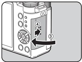 PENTAX Q - Insert the card all the way with the SD Memory Card label facing toward the monitor. - 3