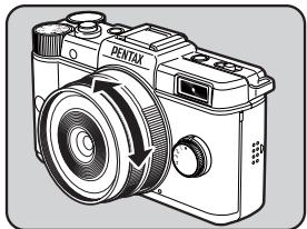 PENTAX Q - While viewing the monitor, turn the focusing ring. - 1