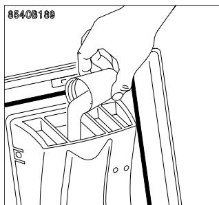 ZANUSSI TLS592C1 - Press the half load pushbutton "1/2" if required. - 2