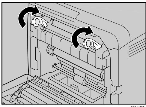 RICOH AFICIO SP C220N - Carefully lift the blue fusing unit levers. - 1
