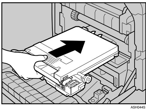 RICOH AFICIO SP C220N - Hold the center of the new waste toner bottle, and then carefully insert it halfway into the printer body. - 1