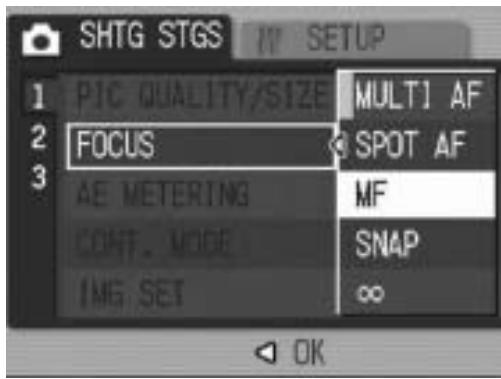 RICOH CAPLIO GX100 - Press the  buttons to select [MF]. - 1