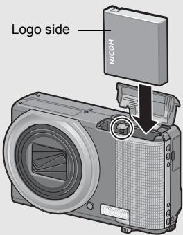 RICOH CX2 - Insert the rechargeable battery. - 1