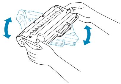 RICOH FAX2210L - Remove the starter toner cartridge from its bag. Gently roll the cartridge 5 or 6 times to distribute the toner evenly inside the cartridge. - 1