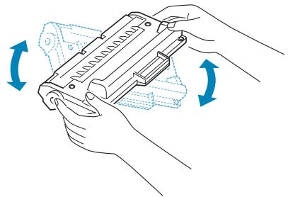 RICOH FAX2210L - Remove the starter toner cartridge from its bag. Gently roll the cartridge 5 or 6 times to distribute the toner evenly inside the cartridge. - 1