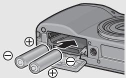 RICOH GR DIGITAL II - Loading AAA Alkaline Batteries (Available in Stores) - 1