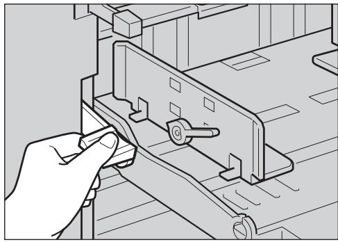 RICOH PRIPORT DX 2430 - Lower the paper feed tray adjustment lever. - 1