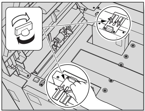 Technical diagram showing mechanical assembly with labeled components and directional arrows indicating motion or movement.