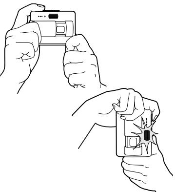 KONICA MINOLTA DIMAGE X60 - TENUE DE L'APPAREIL PHOTO - 1