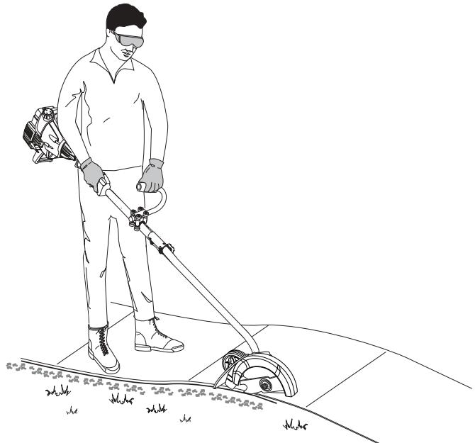 MTD TB25ET - HOLDING THE UNIT WITH EDGER ADD-ON - 2
