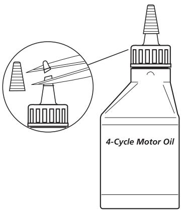 MTD YM26CO - CARGA DE ACEITE EN EL CARTER DEL CIGUENAL: USO INICIAL - 1
