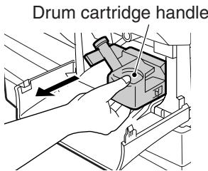 OLIVETTI D-COPIA 120/150 - Hold the drum cartridge handle and gently pull the cartridge out. Dispose of the old drum cartridge in accordance with local regulations. - 1