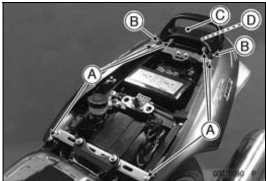 Labeled diagram of a motorcycle engine bay with components A, B, C, D marked for identification