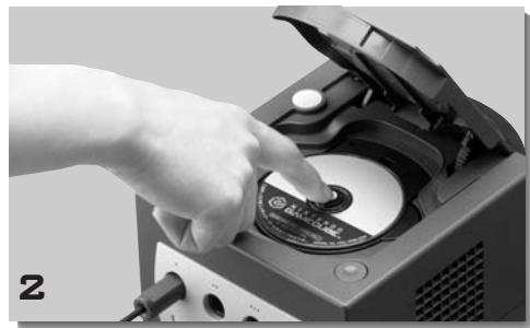 NINTENDO GAMECUBE SYSTEM - REMOVING A GAME DISC - 2