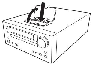 ONKYO CR-545 - Inserting your iPod into the CD receiver's dock for iPod. - 1