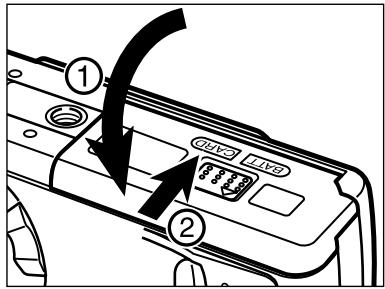 MINOLTA DIMAGE E201 - CHANGING BATTERIES - 4