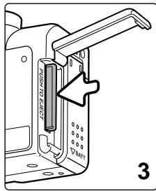 MINOLTA DIMAGE F200 - Changing the memory card - 4