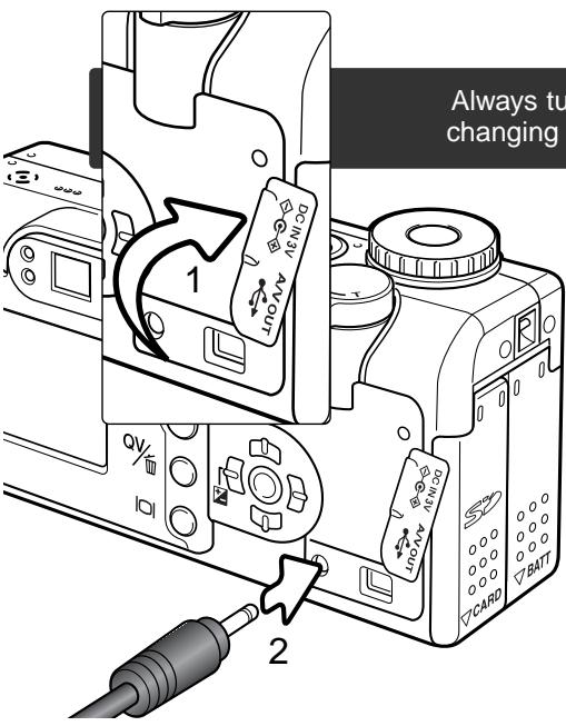 MINOLTA DIMAGE F200 - Connecting the AC adapter (sold separately) - 1