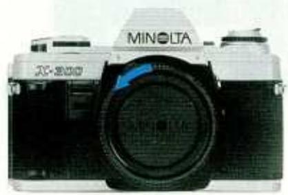 MINOLTA X-300 - Preparation a la prise de VUE fixation et retrait de l'objectif - 1