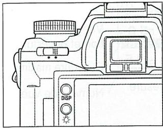 MINOLTA DYNAX 7 - Appuyer sur la touche ADJ. - 1
