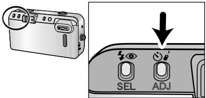 Diagram showing a camera module with labeled buttons: SEL and ADJ, and a downward arrow indicating action or change.