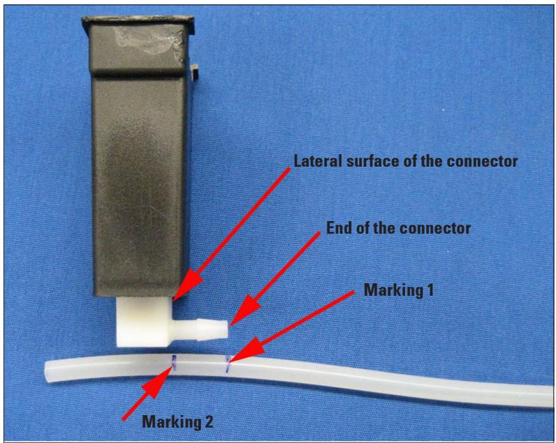 Lateral surface of the connector End of the connector Marking 1 Marking 2