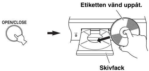 YAMAHA CD-S700 - Tryck in OPEN/CLOSE for att öppna skivf Jacket och satt i en skiva. - 1