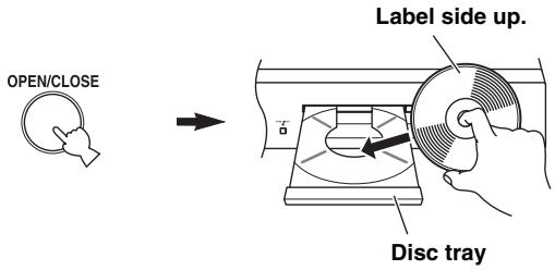YAMAHA CD-S700 - Press OPEN/CLOSE to open the disc tray, and load a disc. - 1