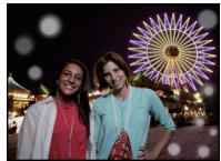 PANASONIC LUMIX DMC-SZ1EF - Hvide runde prikker, der ligner sæbebobler, vises på det optagne billede. - 1