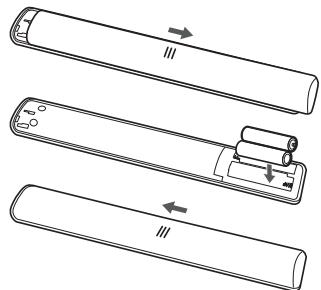 TCL U60V6026 - Installation des piles - 1